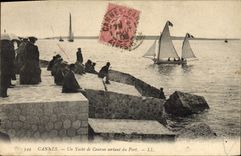 VINTAGE POSTCARD Bateau Fishes Cannes a Racing yacht leaving the port