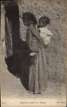 VINTAGE POSTCARD Negro black Woman Negress carrying a child