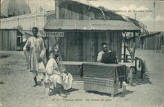 VINTAGE POSTCARD Negro Black Man Fair of Nantes 1904 Black Village the sitting Draftsman