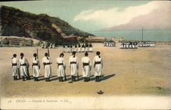 POSTAL Militaria Orán Zouaves de la VENDIMIA con el ejercicio