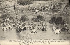 VINTAGE POSTCARD Militaria Oudjda Morocco the squadron of Spahis having taken share with the combat of Foum Safrou crossing Tafna