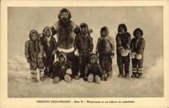 VINTAGE POSTCARD Polar Eskimo Missions Missionary and his children with catechism