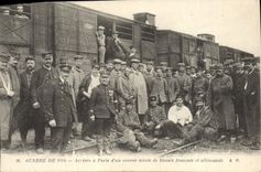 Vintage Postcard Sante Militaria Arrivee has Paris of a mixed convoy of wound French and German