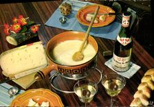 Postal cocina el plato de queso fundido