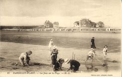 Vintage Postcard Hardelot Beach plays on the beach