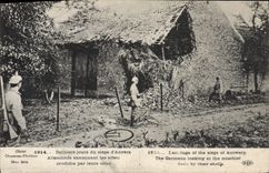 CPA Militaria 1914 Deriners jours du siÃ¨ge d'Anvers Allemands Examinant les effets produits pas leu