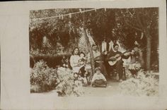 CARTE PHOTO Famille Guitare
