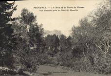 CPA Provence Les Baux et les Ruines du Chateau vue lointaine prise du Parc de Manville 